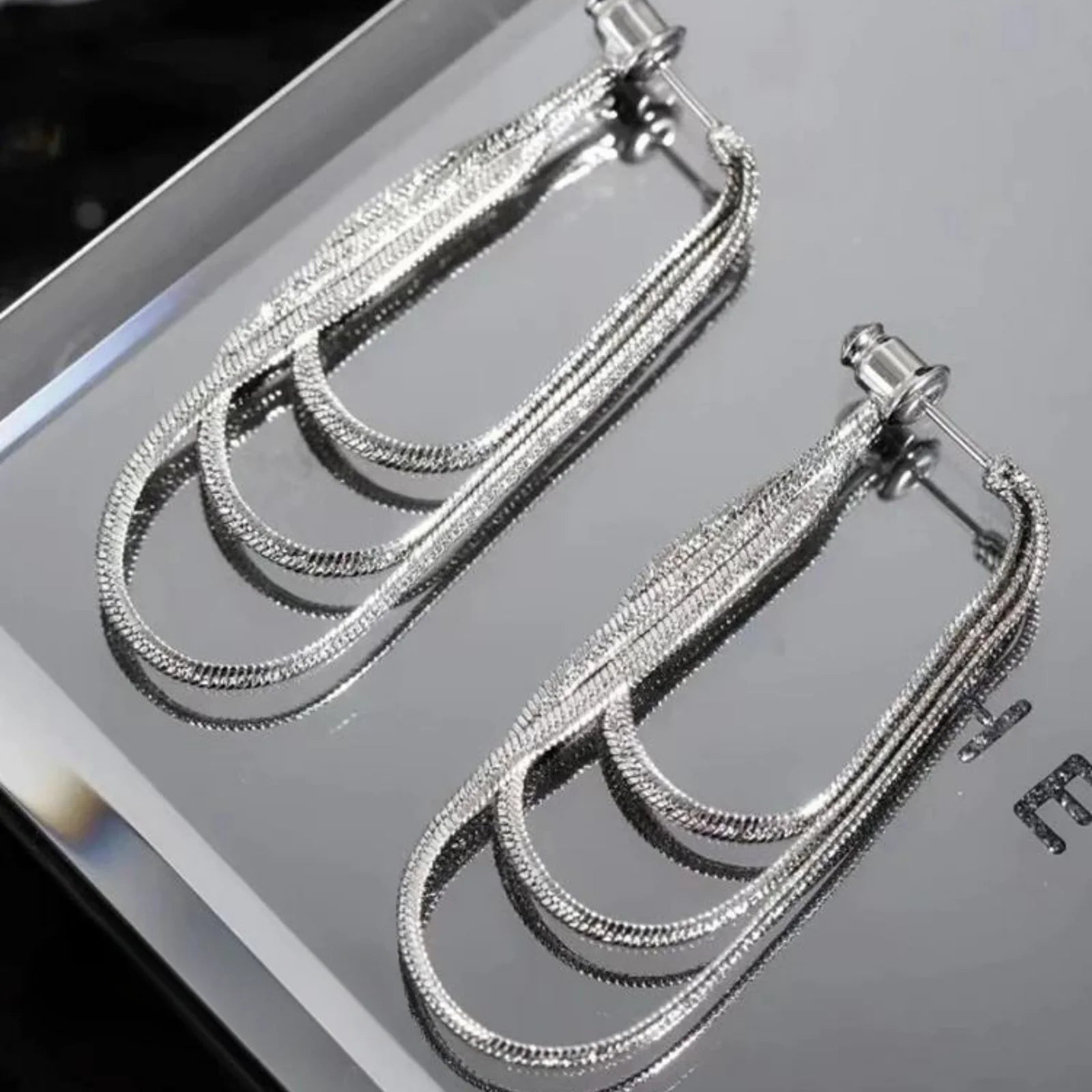 Orecchini Quinn – Tidlös elegans, subtil styrka